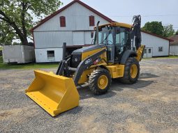 
										2011 DEERE 410J full									