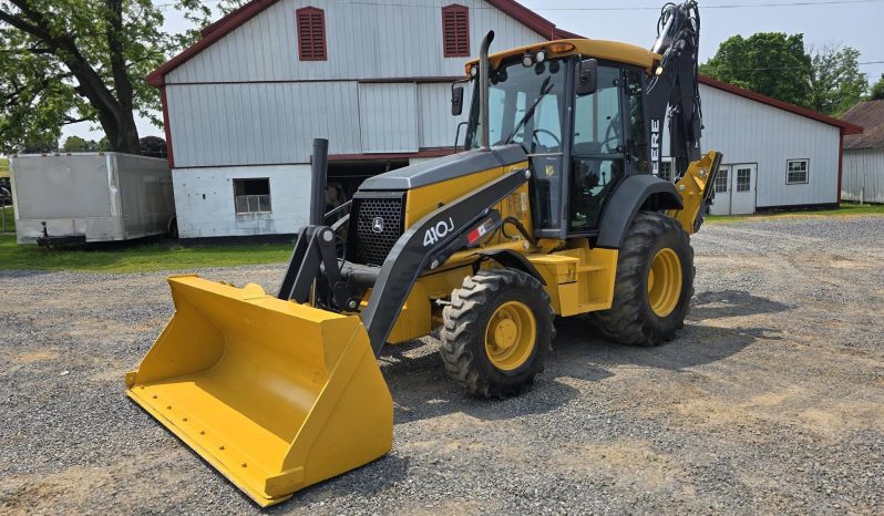 
								2011 DEERE 410J full									