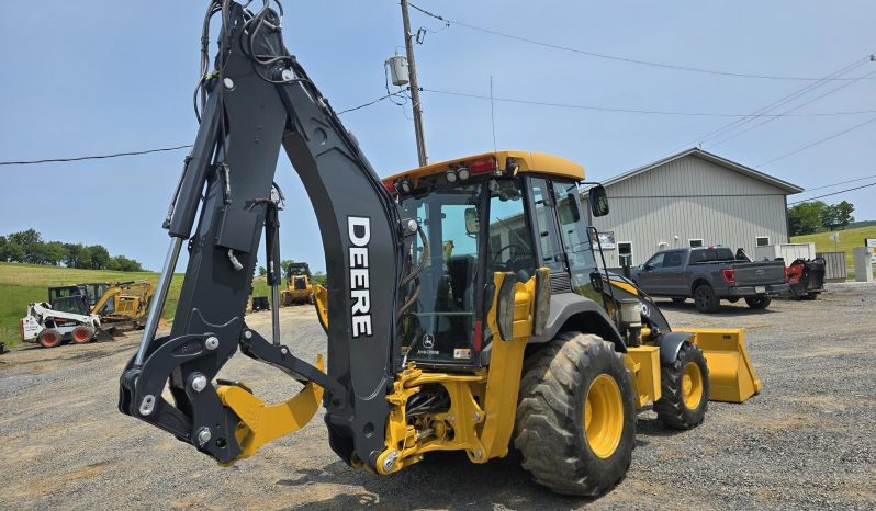 
								2011 DEERE 410J full									