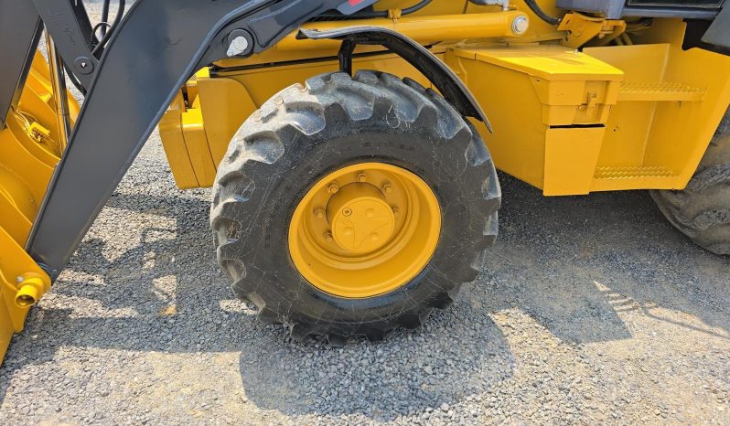 
								2011 DEERE 410J full									