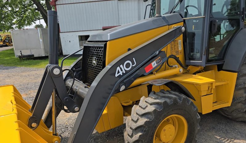 
								2011 DEERE 410J full									