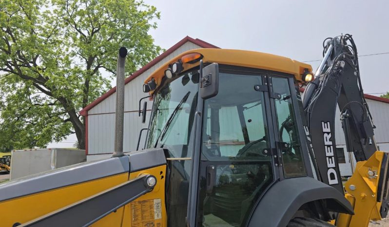 
								2011 DEERE 410J full									