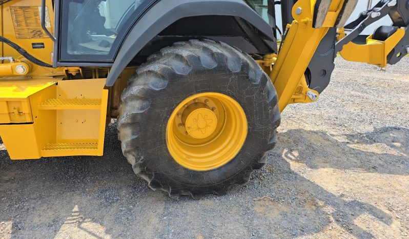 
								2011 DEERE 410J full									