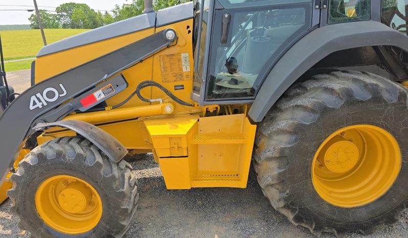 
								2011 DEERE 410J full									