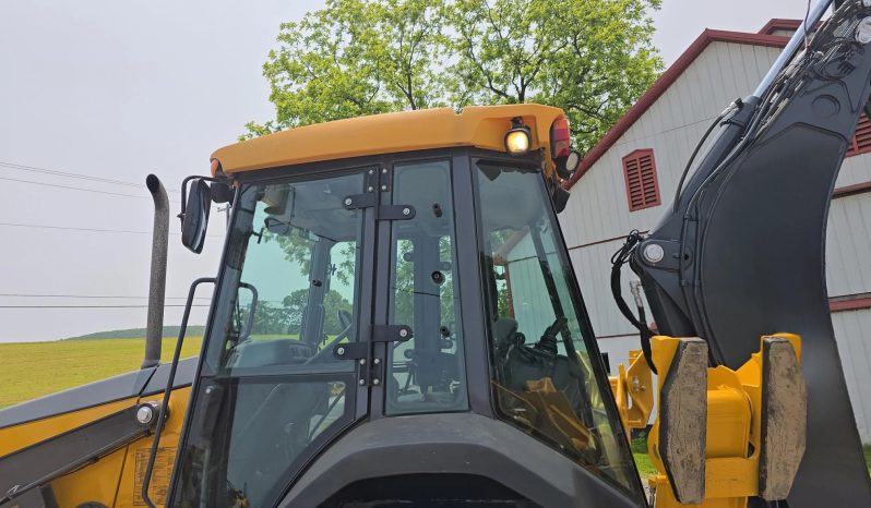 
								2011 DEERE 410J full									