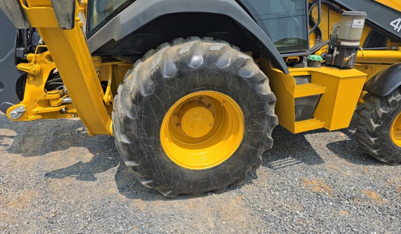 
								2011 DEERE 410J full									