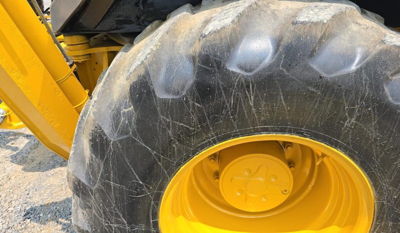 
								2011 DEERE 410J full									