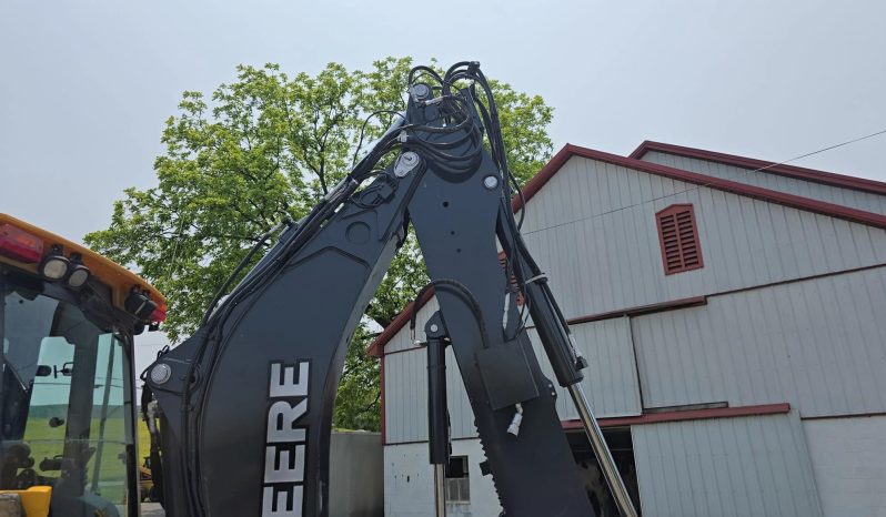 
								2011 DEERE 410J full									