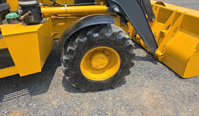 
								2011 DEERE 410J full									