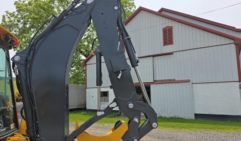 
								2011 DEERE 410J full									