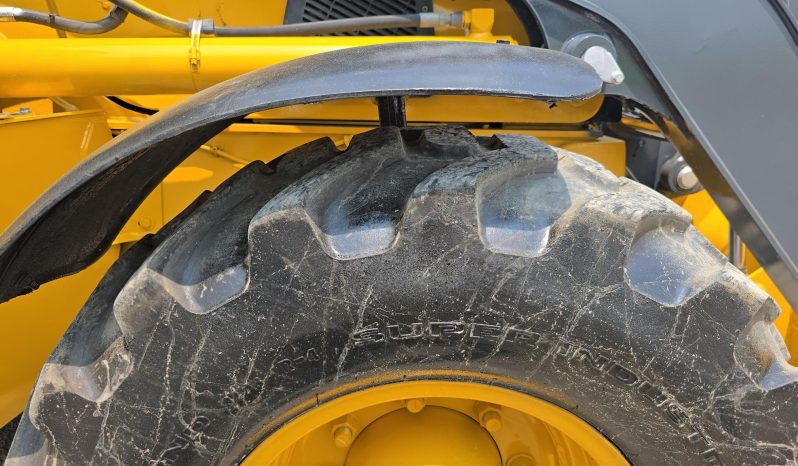 
								2011 DEERE 410J full									