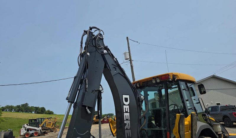 
								2011 DEERE 410J full									