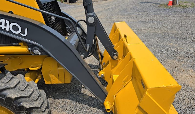 
								2011 DEERE 410J full									