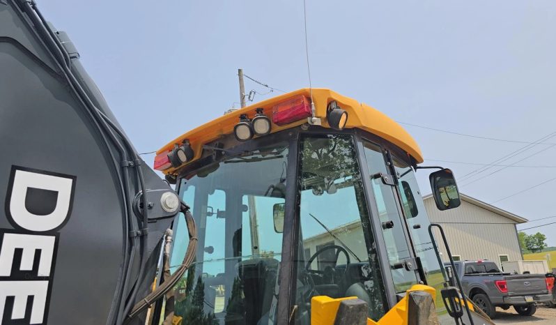 
								2011 DEERE 410J full									