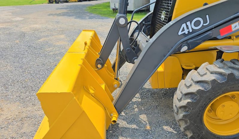 
								2011 DEERE 410J full									