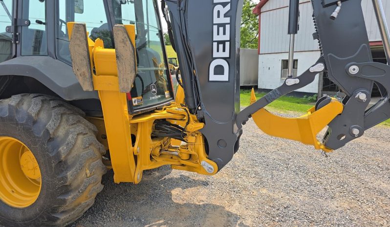 
								2011 DEERE 410J full									