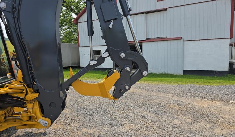 
								2011 DEERE 410J full									