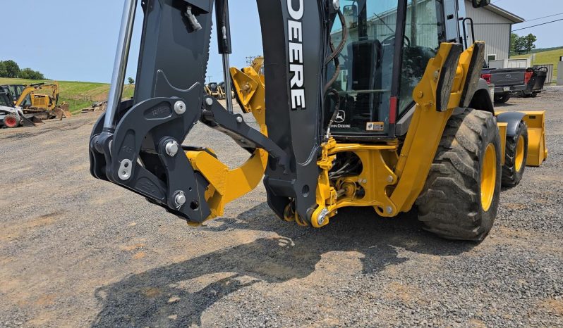 
								2011 DEERE 410J full									