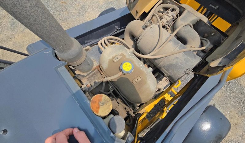 
								2011 DEERE 410J full									