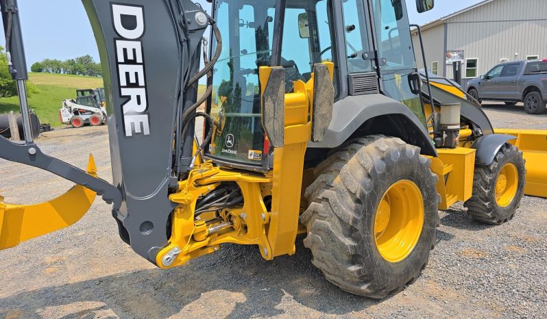
								2011 DEERE 410J full									