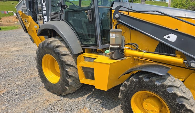 
								2011 DEERE 410J full									