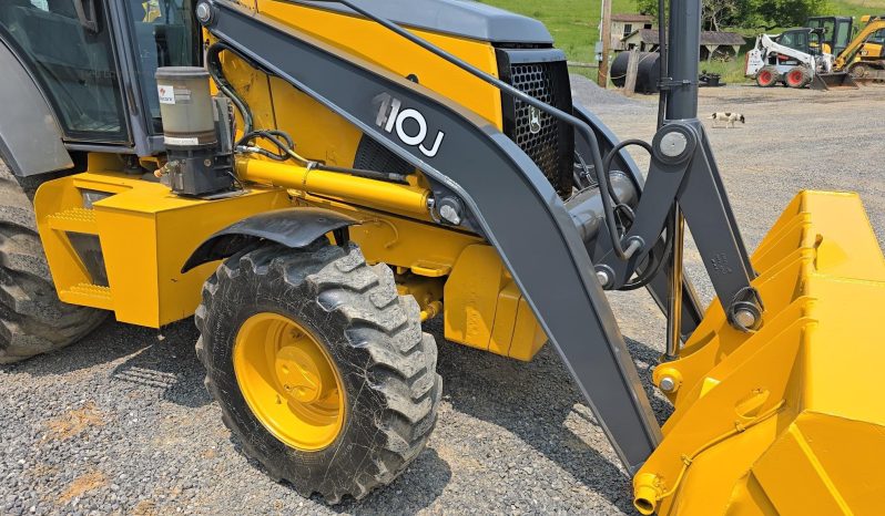 
								2011 DEERE 410J full									