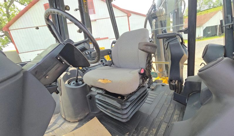 
								2011 DEERE 410J full									