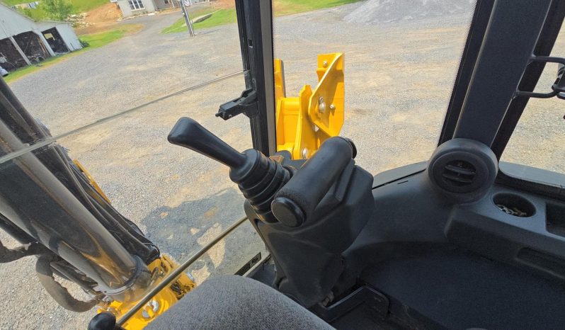 
								2011 DEERE 410J full									