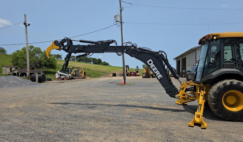 
								2011 DEERE 410J full									