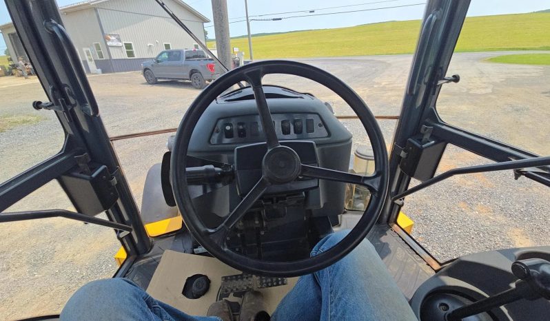 
								2011 DEERE 410J full									