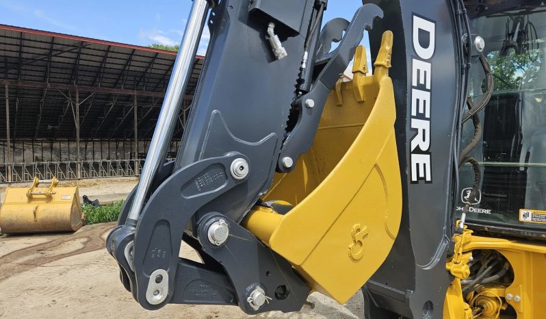 
								2011 DEERE 410J full									